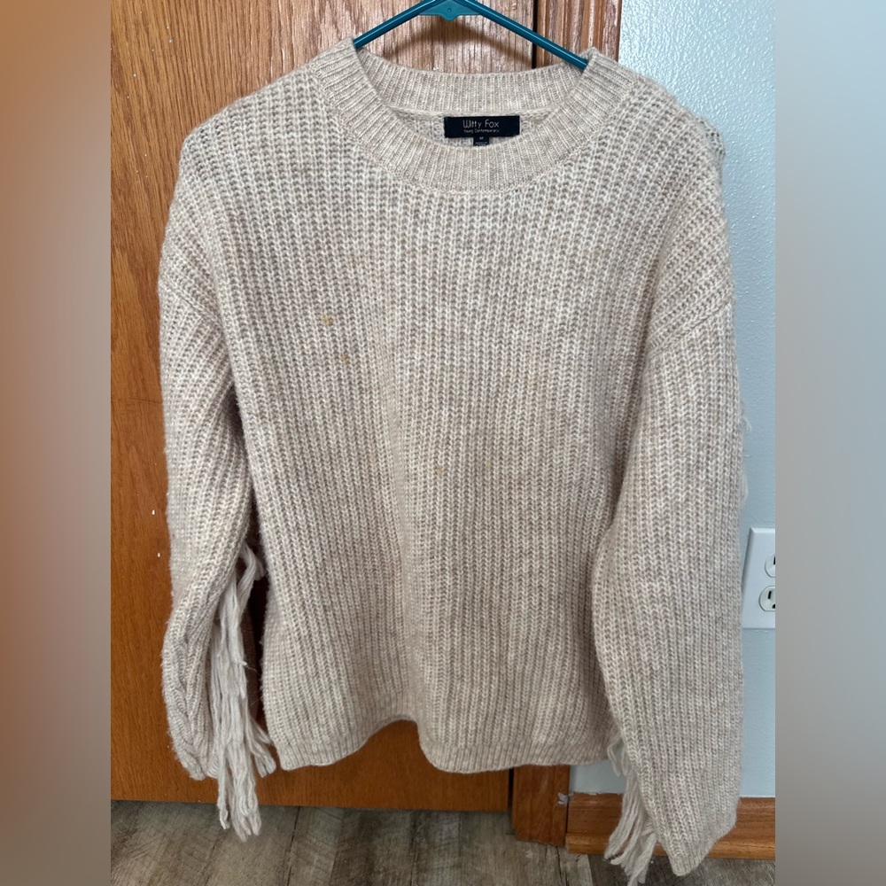 Witty Fox cream sweater Size M with fringe detail across back/sleeve